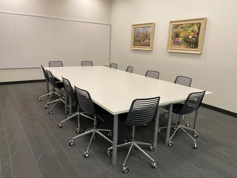 Conference room 2 large room with table and chairs