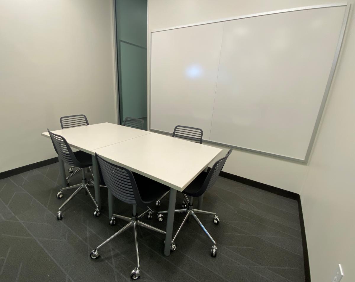 Conference Room 4 small room with table and chairs